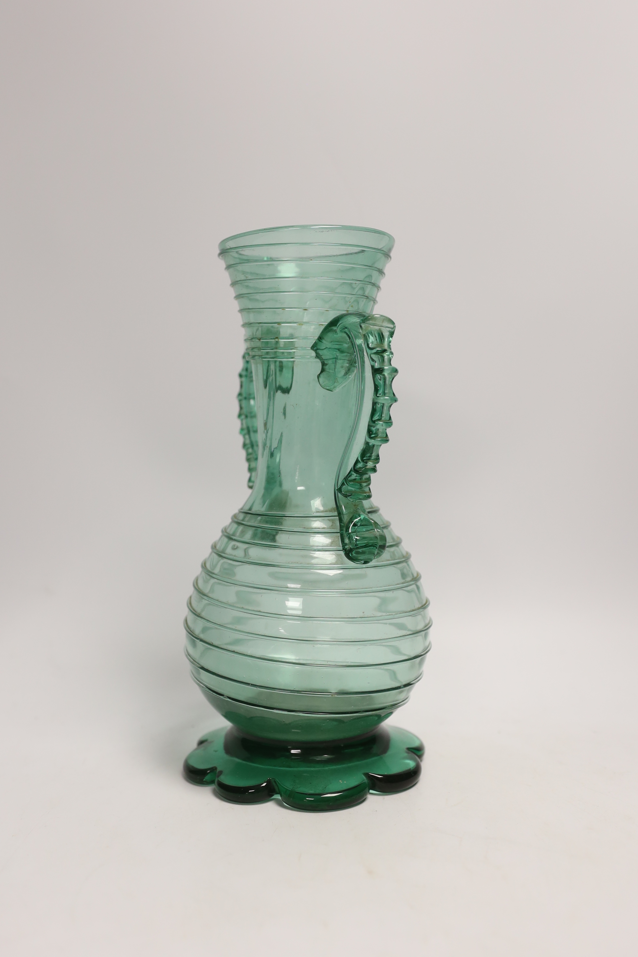 A hand blown green two handled Mallorcan glass vase, 20th century, 26.5cm high